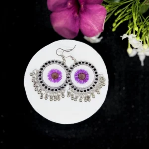 A real purple flower preserved in a clear resin pendant, paired with a shimmering 925 sterling silver gold-plated chain.