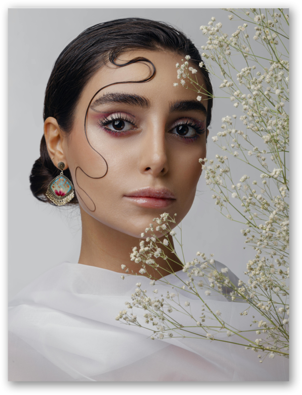 woman wearing resin earrings