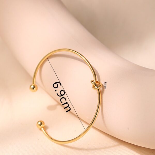 Knot Tie Gold Plated Bangle Bracelet